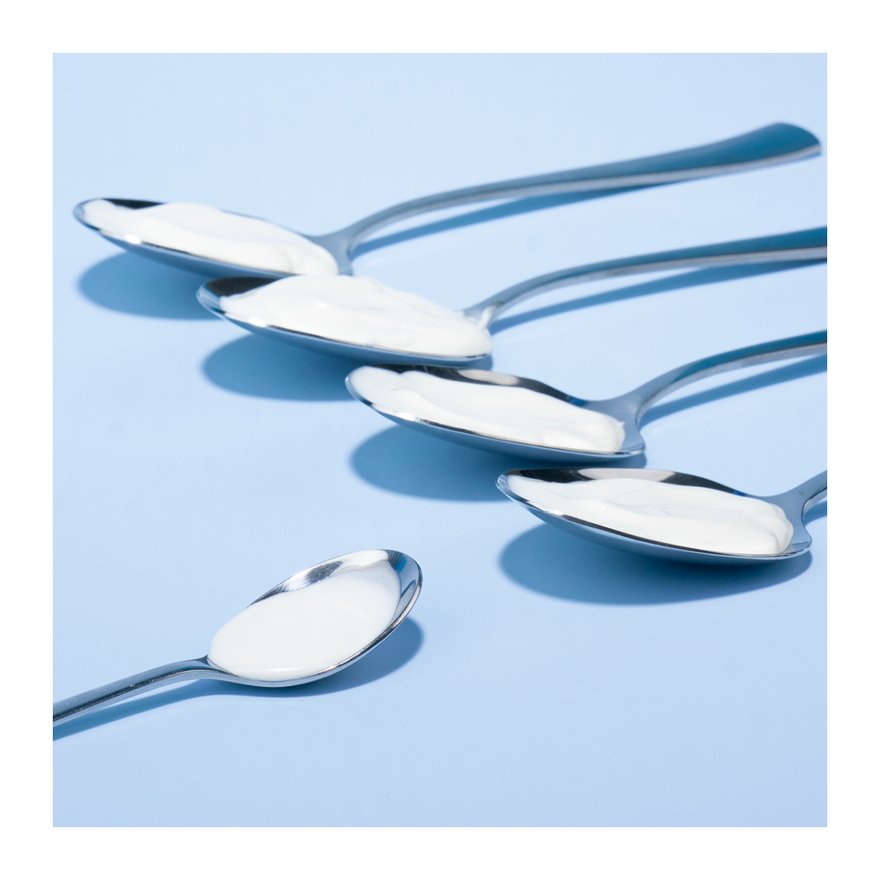 Löffel mit richtiger Sonnenschutzmenge